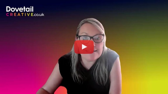 woman sitting in front of coloured background